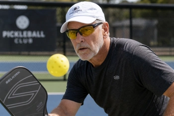 Learn how contrast lenses and trained eye tracking reduce falls and improve reaction time on the court.
